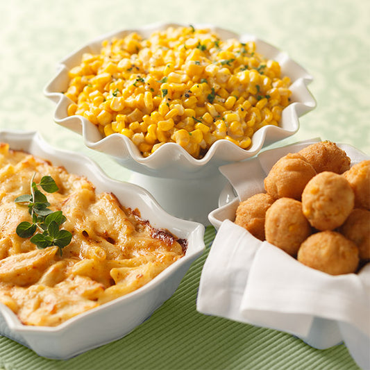 Southern Sides Sampler, featuring Macaroni & Cheese Casserole, Eastern Shore Creamed Corn Casserole, and Sweet Corn Hush Puppies (from left to right)